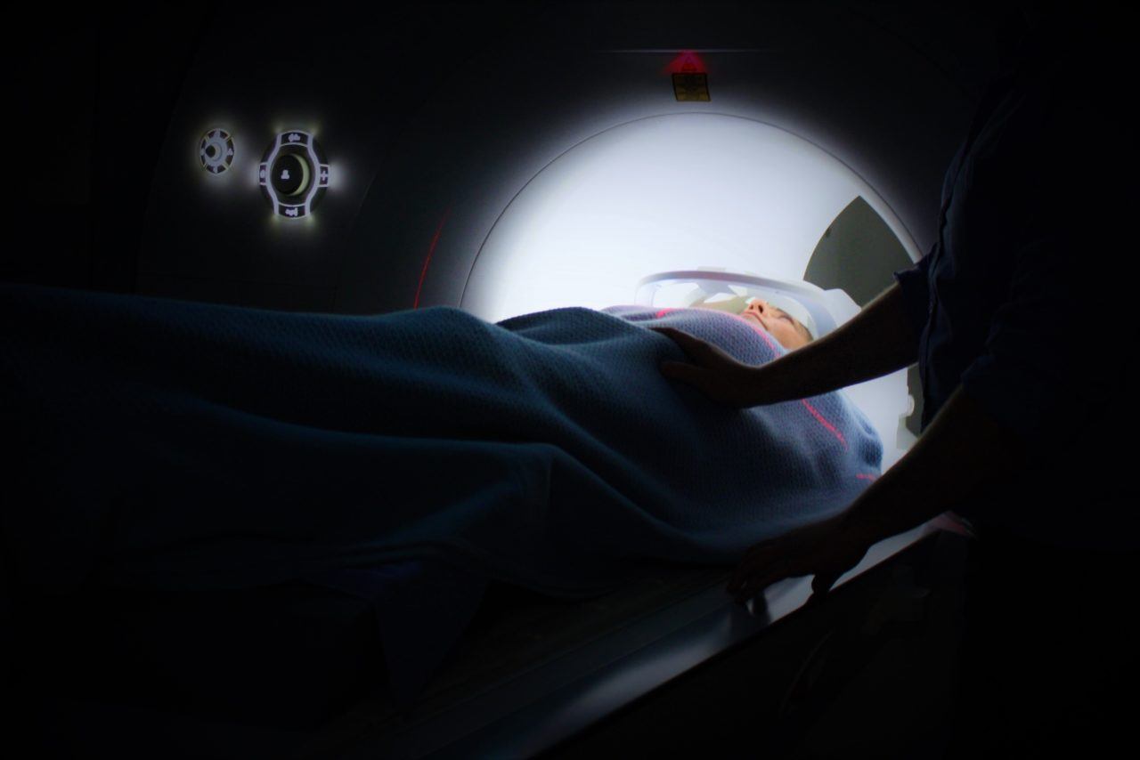 An MRI machine scans a patient