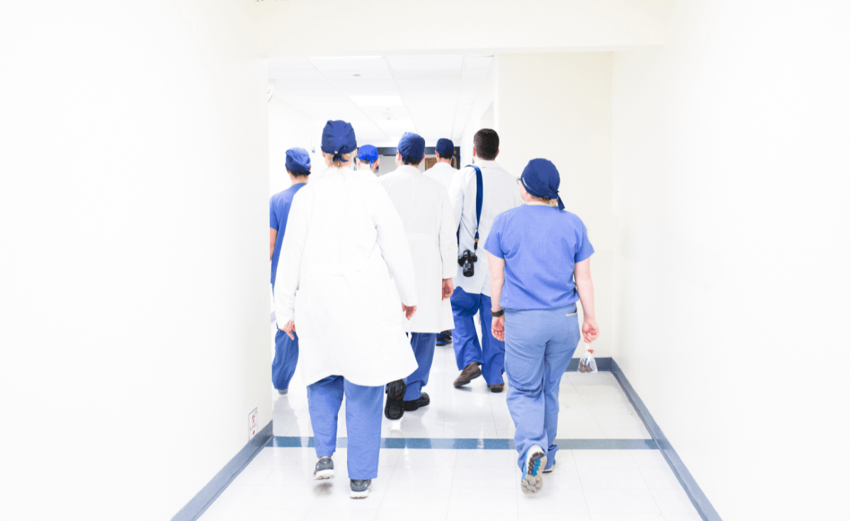 Doctors walking down a hospital corridor