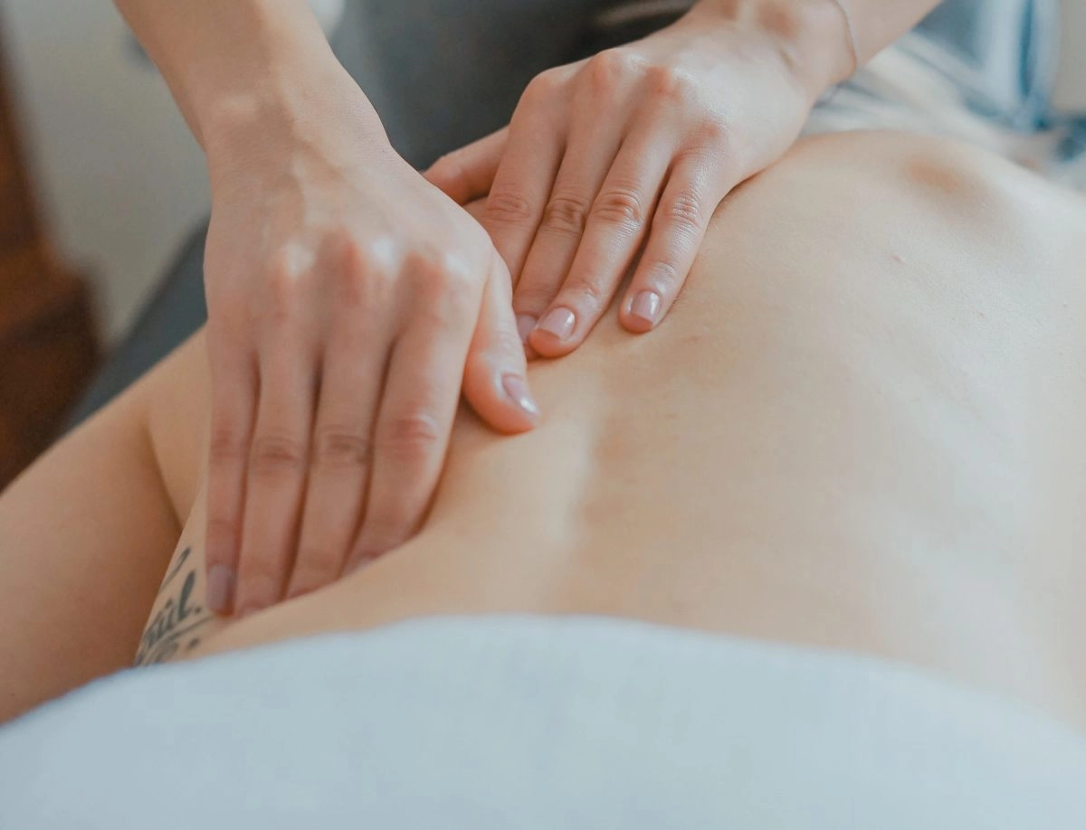 Close up of a back being massaged