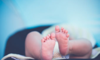 Picture of a baby where only the soles of the feet are visible