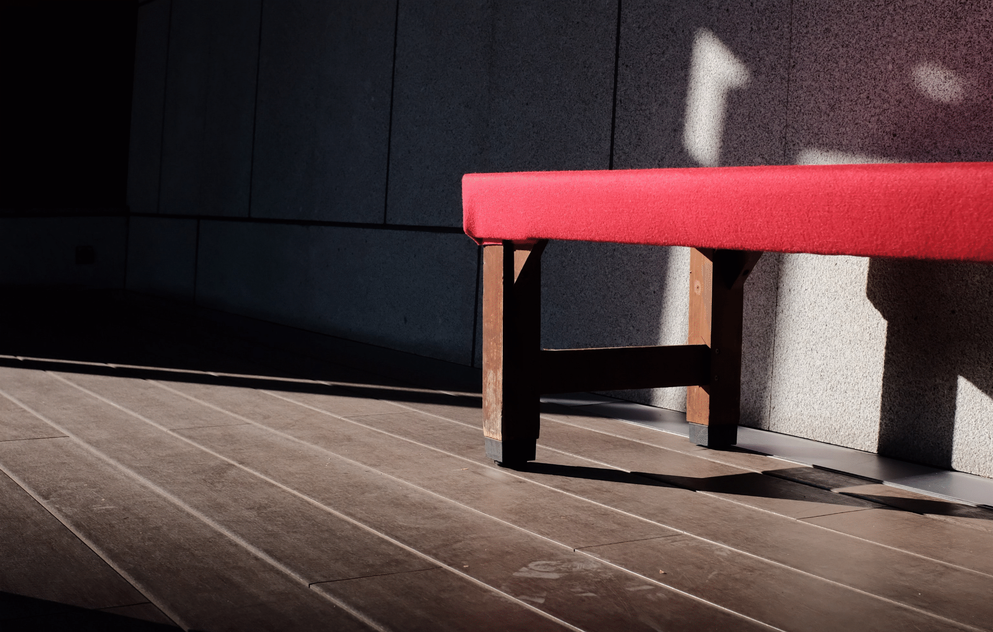 a gym stool in shadow