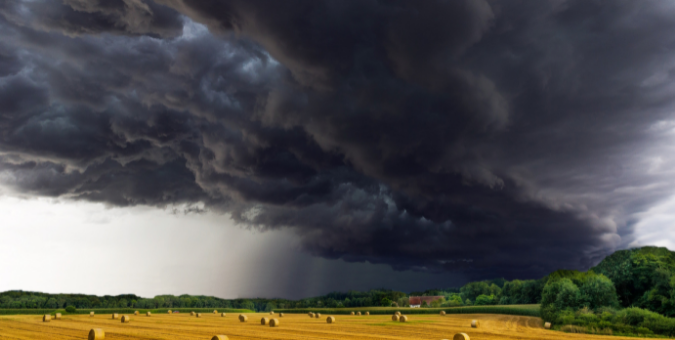 A storm forming over a field