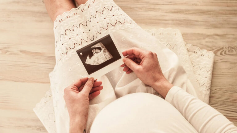 holding ultrasound photo