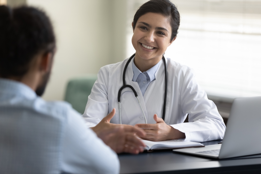 Doctor consulting patient