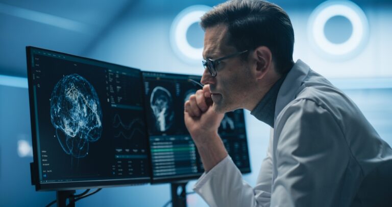 Doctor looking at brain scan