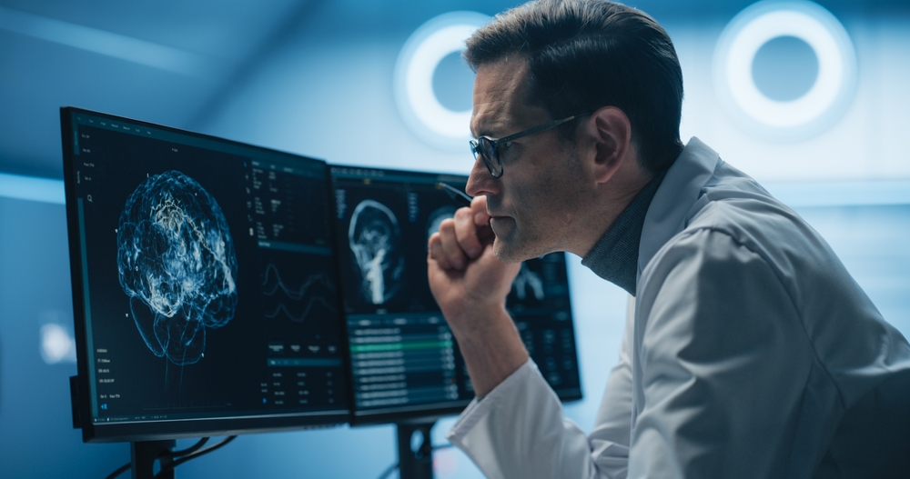 Doctor looking at brain scan