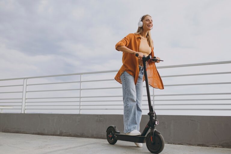 woman riding an e-scooter