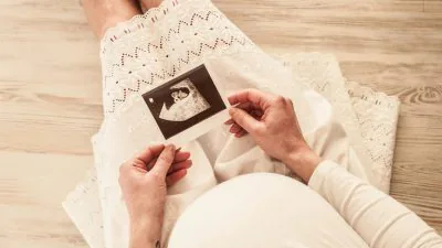 holding ultrasound photo