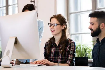 Young,Architects,Working,On,Project,In,Office