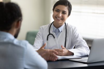 Doctor consulting patient