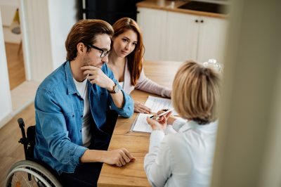 High,Angle,View,Of,A,Couple,And,Real,Estate,Agent